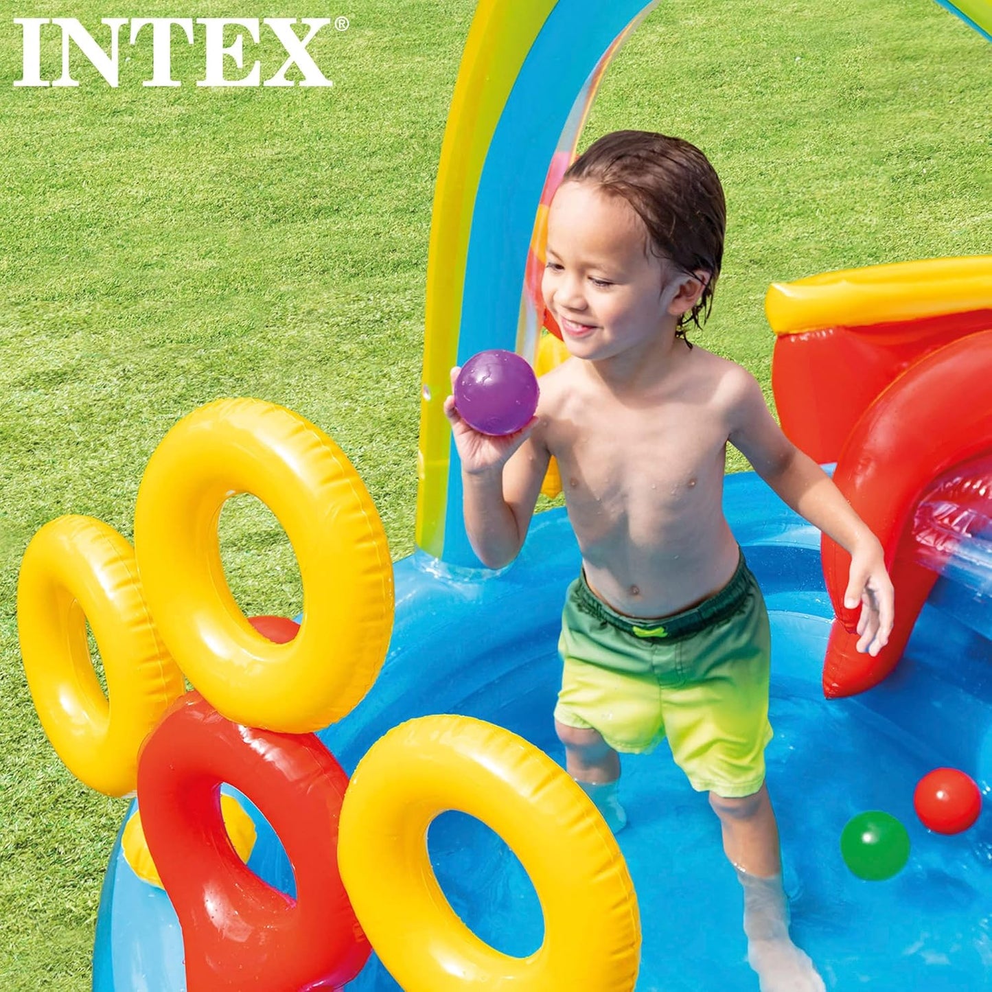 57453EP 9.75 Foot x 6.3 Foot x 53 Inch Multicolor Rainbow Slide Kids Inflatable Pool with Water Slide and Ring Toss for Children Ages 2 and Up